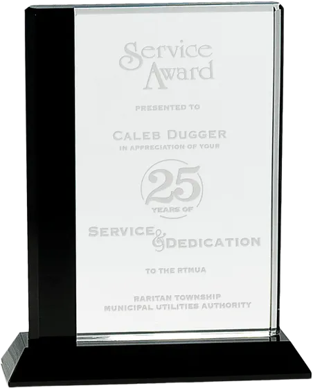 Black edge crystal panel on a black base, engraved as a 25 year service award
