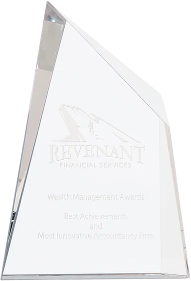 Faceted crystal wedge award engraved with a company logo